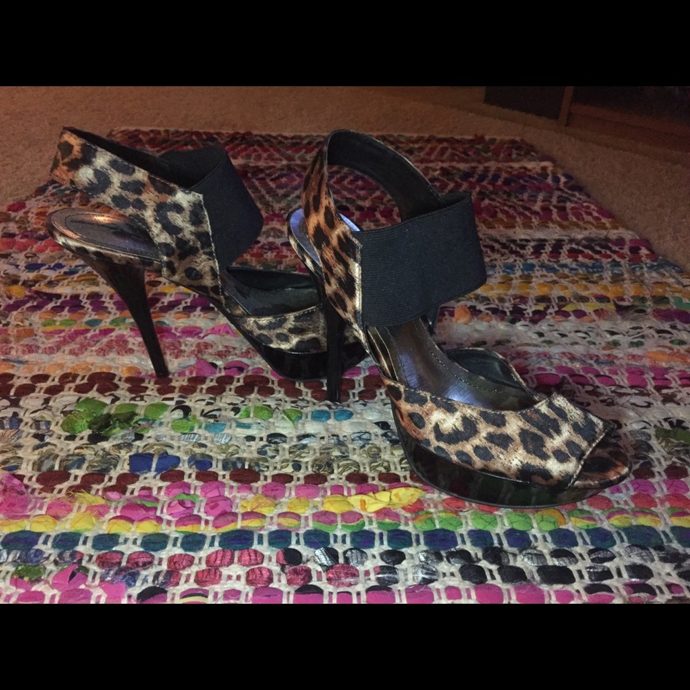 Platform cheetah print skinny peep toe stiletto